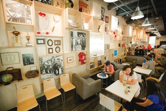 a cafe with historical items on a wall