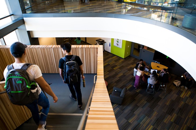 students walking down stairs