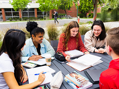 students sitting around a table