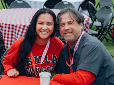 man and woman smiling