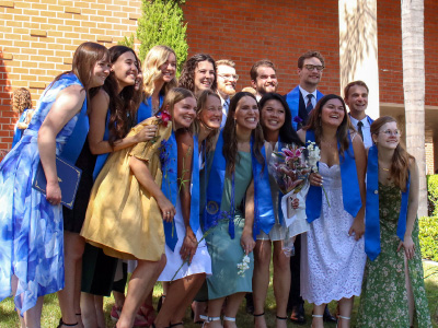 a group of young people posing for a photo